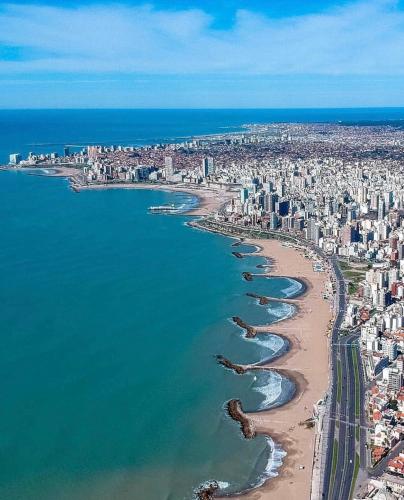 an aerial view of a beach and a city at Hotel Ramos Mejía in Mar del Plata