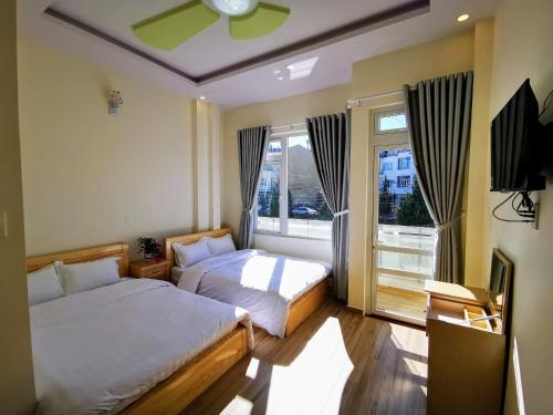 TV a/nebo společenská místnost v ubytování Sơn Liễu Homestay