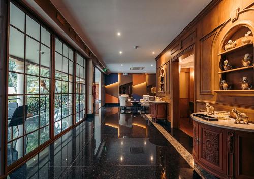 Kuchyň nebo kuchyňský kout v ubytování Luxva Hotel Boutique