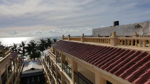 a view of the ocean from the balcony of a building at Golden Phoenix Hotel Boracay in Boracay