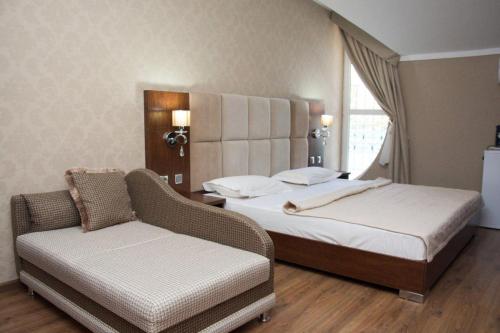 Krevet ili kreveti u jedinici u objektu B&B Lake House Hotel