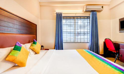 Postel nebo postele na pokoji v ubytování Itsy Hotels Ammu Regency