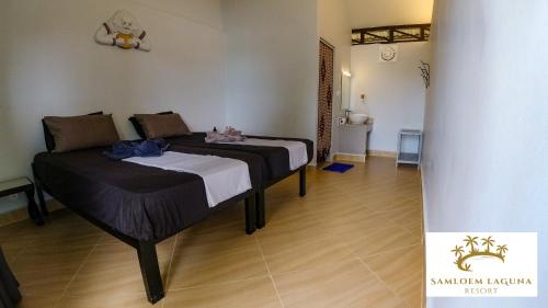 Postel nebo postele na pokoji v ubytování Samloem Laguna Resort