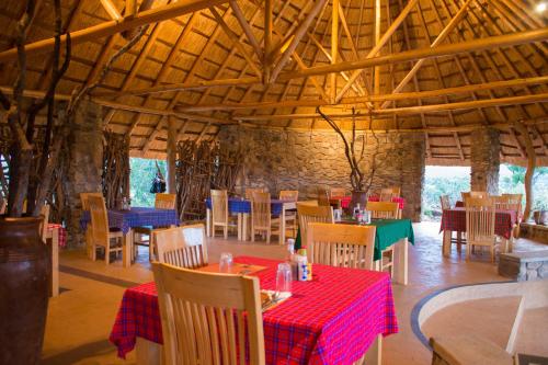A restaurant or other place to eat at Kidepo Savannah Lodge by NATURE LODGES LTD