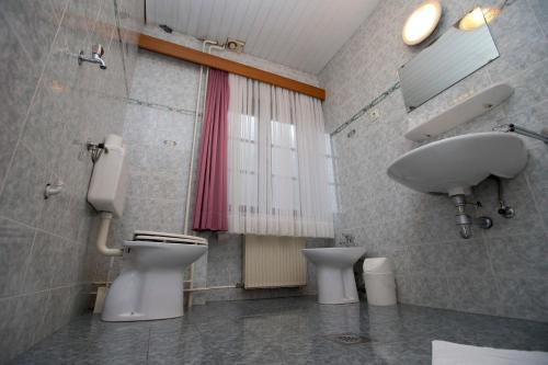 Et badeværelse på Guesthouse Špenko