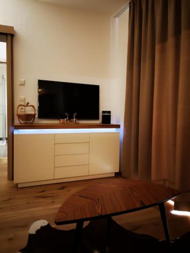 TV a/nebo společenská místnost v ubytování Appartement Bella Vista