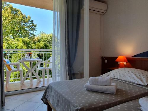 Cama o camas de una habitación en Tourist Settlement Brzet