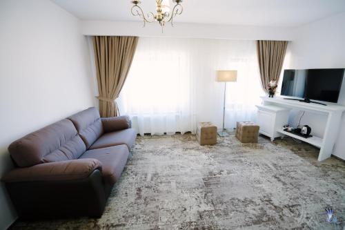 TV a/nebo společenská místnost v ubytování Hotel La Belle Epoque
