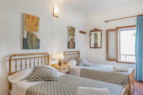 Postel nebo postele na pokoji v ubytování CAsA SA MARINA