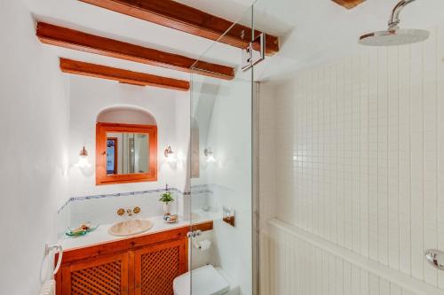 a bathroom with a sink and a shower at Villa Son Beltran Valldemossa in Valldemossa