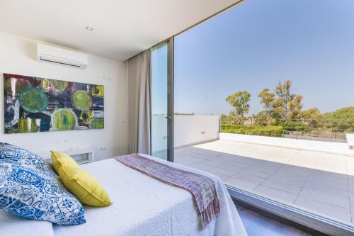 Ένα ή περισσότερα κρεβάτια σε δωμάτιο στο Villa Sa Torre - Family Only