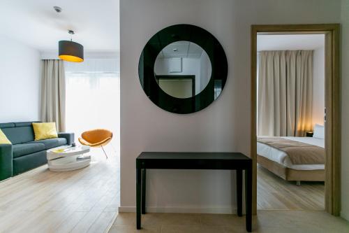 Кровать или кровати в номере Varsovia Apartamenty Kasprzaka
