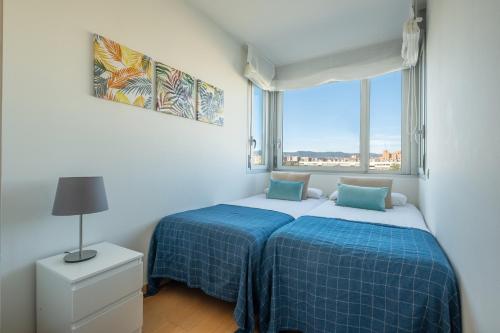 Katil atau katil-katil dalam bilik di Rent Top Apartments Forum