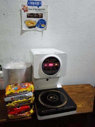 a food processor sitting on top of a table at Seong Dong Jang in Daegu