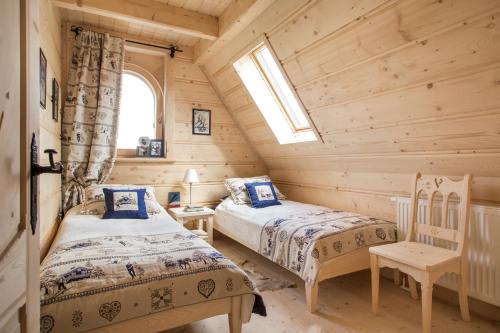 صورة لـ TatryTop Osada Luxury Chalets Kościelisko في كوشتيليسكا