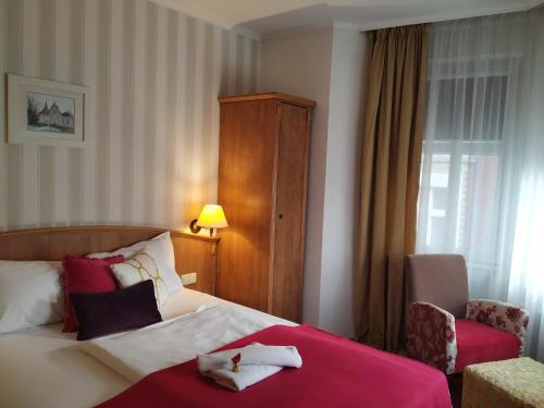 Кровать или кровати в номере Hotel Stare Miasto Old Town
