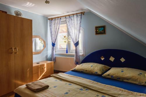 Postel nebo postele na pokoji v ubytování Apartman Elegant