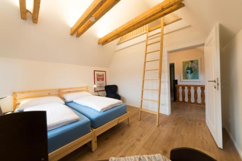 Llit o llits en una habitació de Ferienhaus Casa Sol