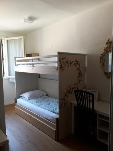 A bed or beds in a room at Il Borgo dei Molini