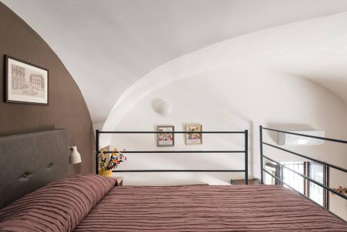 Postel nebo postele na pokoji v ubytování Il Vicoletto Guest House