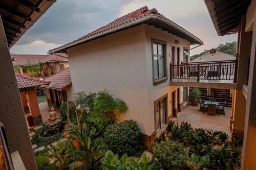 an aerial view of a house with a balcony at Villa Bali Luxury Guesthouse in Bloemfontein