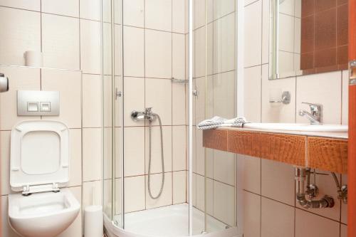 Ванная комната в Vournelis Hotel