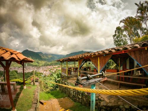 a building with a yellow rope and a view of a city at Jardín by Bernalo Hotels in Jardin