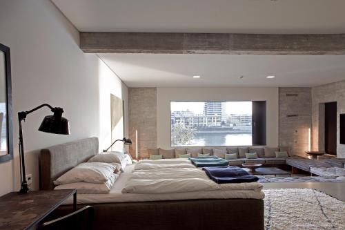 Una cama o camas en una habitación de Speicher7 Hotel