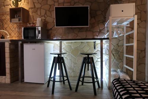 Una cocina o zona de cocina en Cactus 31