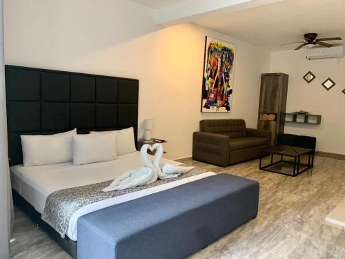 En eller flere senge i et værelse på SILVERSANDS Hotel Boutique - 5Th Ave