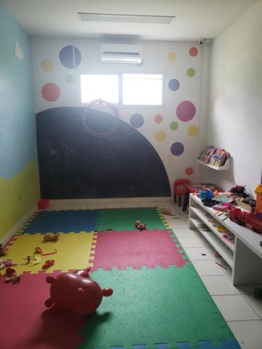 Postel nebo postele na pokoji v ubytování LOFT SAHY MANGARATIBA