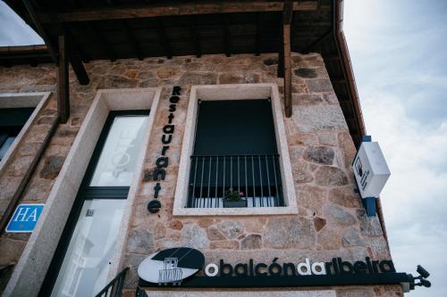 a window on the side of a building at O balcón da ribeira in Parada del Sil