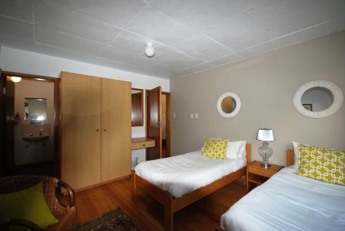 Villa Winglo tesisinde bir odada yatak veya yataklar