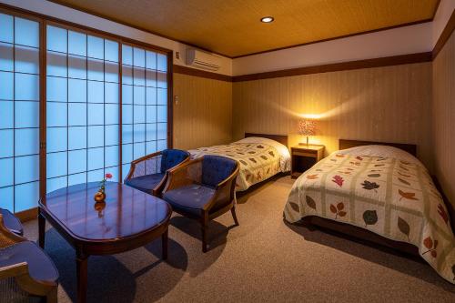 Katil atau katil-katil dalam bilik di Furusato