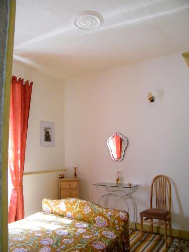 Postel nebo postele na pokoji v ubytování Villa des Capucins