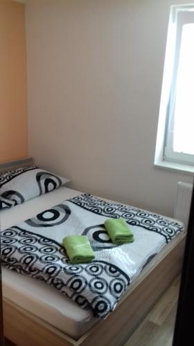 Postel nebo postele na pokoji v ubytování Penzion u Sklípků