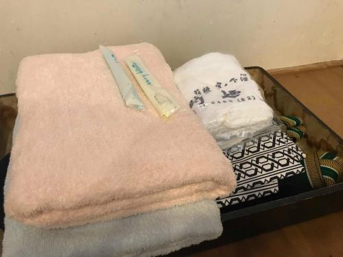 Tsukinoya tesisinde bir odada yatak veya yataklar