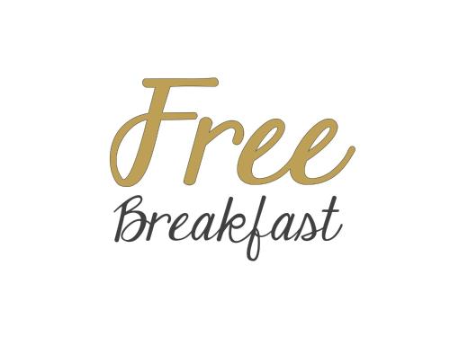 a handwritten inscription free breakfast isolated on white background with gold cursive handwriting at Holiday House Ryukyu-an "MUSIC HOSTEL" in Yomitan