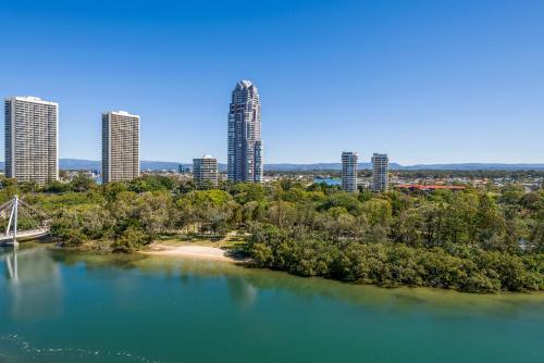 an aerial view of a river with tall buildings at The Waterford on Main Beach in Gold Coast