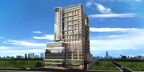 a rendering of a tall building in a city at Citadines Cebu City in Cebu City