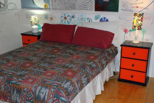 En eller flere senge i et værelse på The Old Cottage @ Cowes