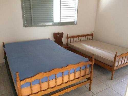 Krevet ili kreveti u jedinici u okviru objekta Casa, Praia e Lazer.