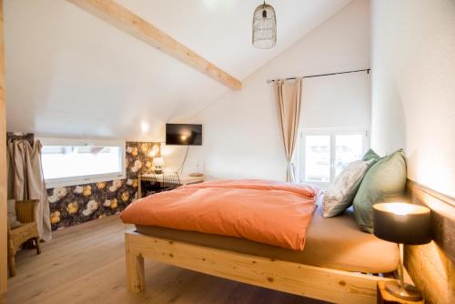 Ліжко або ліжка в номері BnB Logis des Saules