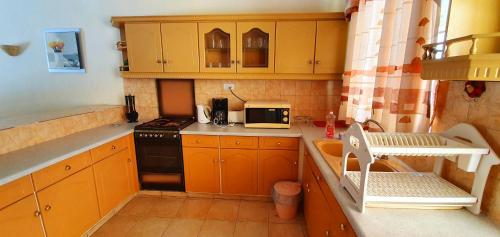 Kuchyň nebo kuchyňský kout v ubytování Residence Le Choisy
