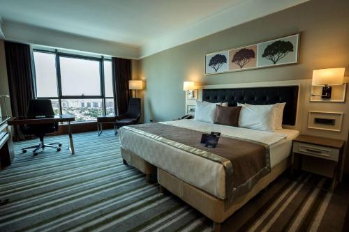Katil atau katil-katil dalam bilik di Radisson Blu Hotel, Diyarbakir