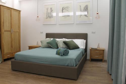 Postel nebo postele na pokoji v ubytování Nannarè Guest House