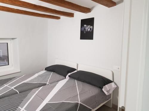 Postel nebo postele na pokoji v ubytování Ca la Quima