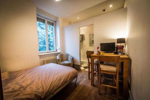 Postel nebo postele na pokoji v ubytování Chambres d'Hôtes Les Deux Hêtres