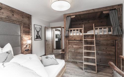 Postel nebo postele na pokoji v ubytování Chalet Nr.121