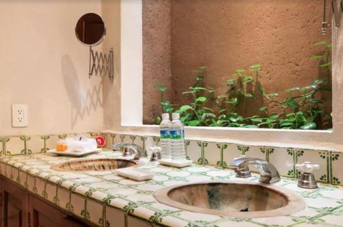 Et badeværelse på Orchidelirium Casa Hotel & Salud Estética